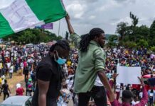 Court restricts Abuja protesters to MKO Abiola stadium