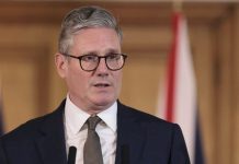 UK to cut refugee protection period