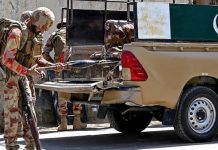 Two Killed In Pakistani Militant Raids On Banks